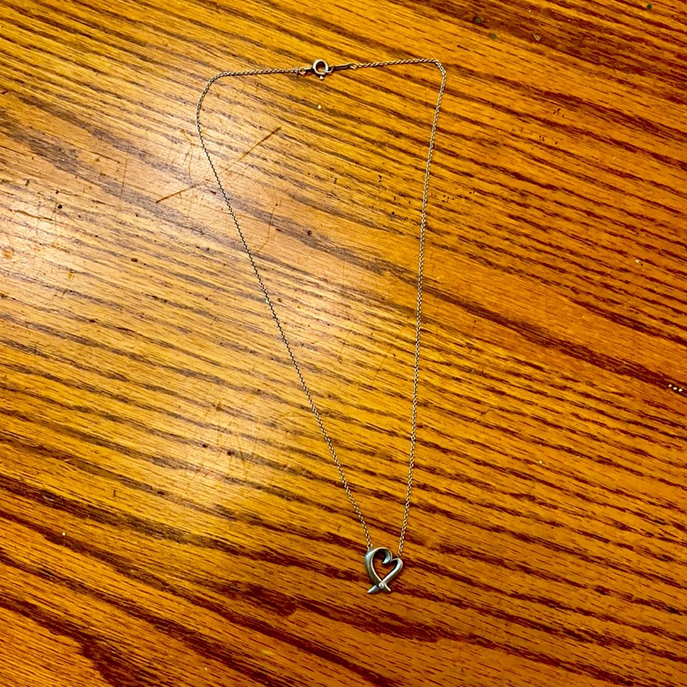 Authentic Tiffany & Co sterling silver with diamond necklace.